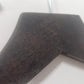 Close-up of the top part of a Rustic Motifs Wooden Hotel Anti Theft Jacket (Dark Brown) 44cm with a dark brown finish and metal hook, hanging against a light-colored wall. The hanger has a slightly curved, wide shoulder design.