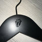 The Black Wooden top hanger branded Rolling Stones 38cm by Rustic Motifs, featuring the iconic Rolling Stones logo with lips and a tongue sticking out, is showcased on a pale wooden surface.