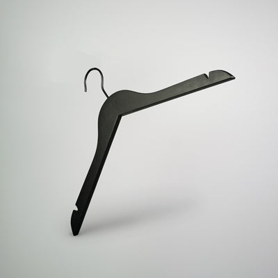 A sleek, black wooden top clothes hanger with a slanted design and hook on top is set against a plain, light-colored background. The Rustic Motifs Black Wooden Top Clothes Hanger with Notch 38cm ensures straps are securely held, and its contoured shape is ideal for various garments.