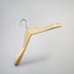 A Rustic Motifs Natural Wooden Jacket Top Coat Hanger 38cm with a metal hook, designed for hanging jackets or shirts. The solid wood hanger has a curved shape and broad shoulders to provide better support for garments, depicted against a plain, light grey background. Perfect for wardrobe organization.