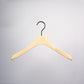 A single Rustic Motifs Premium Natural Wooden Top Jacket Hanger 37cm with a curved, natural wood design and a black metal hook is centered against a plain gray background. The hanger is simple and unadorned, displaying a minimalist aesthetic, ideal for enhancing closet organization.